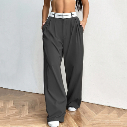 Stijlvolle broek met wijde pijpen 💃 Kleurblokken in de tailleband + hoge taille ✨ Perfect voor werk of om te winkelen 👜